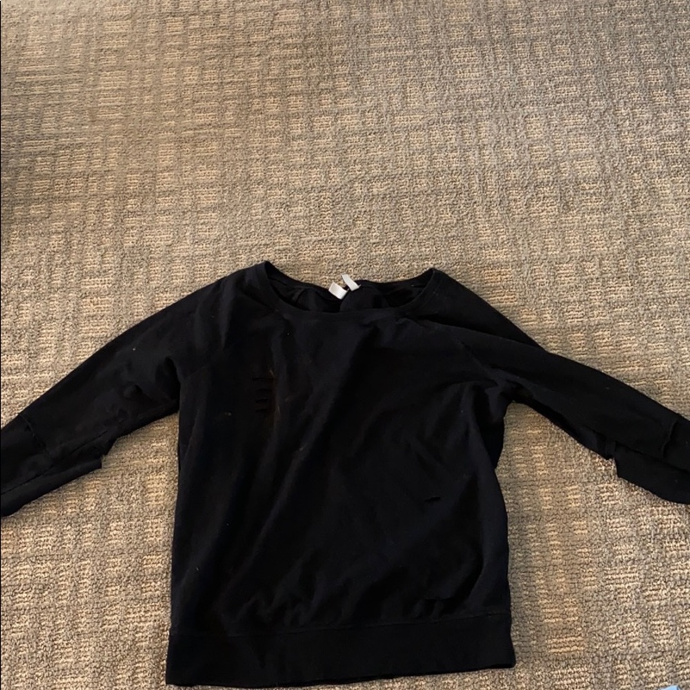 Sweatshirt that has holes in it